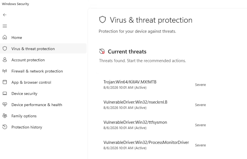 Windows Security showing VulnerableDriver and Trojan detections flagged on write